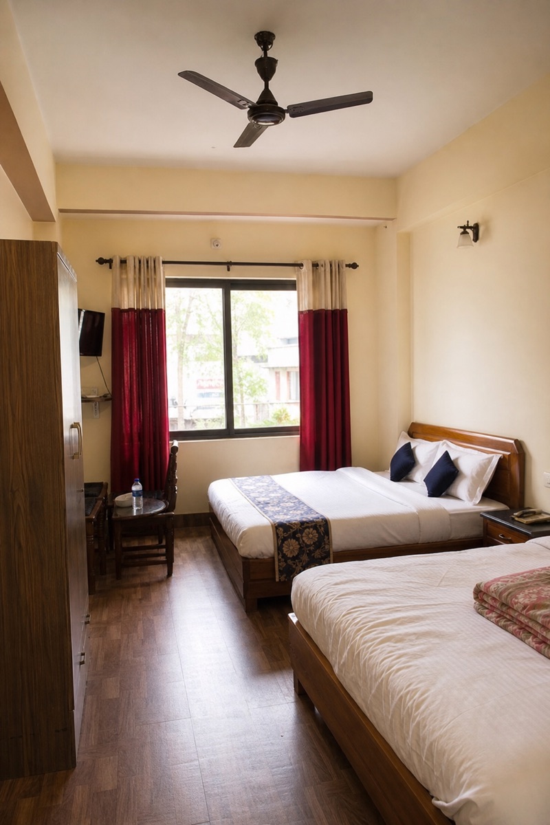 Family room with twin beds at Akabare Inn